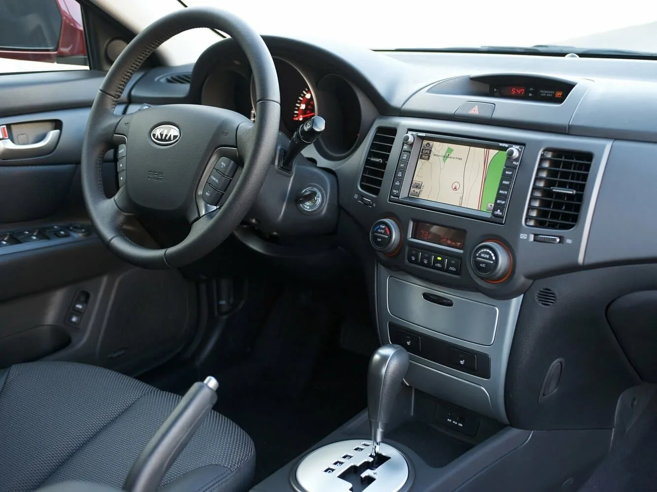 Kia Optima II Рестайлинг — фото 2