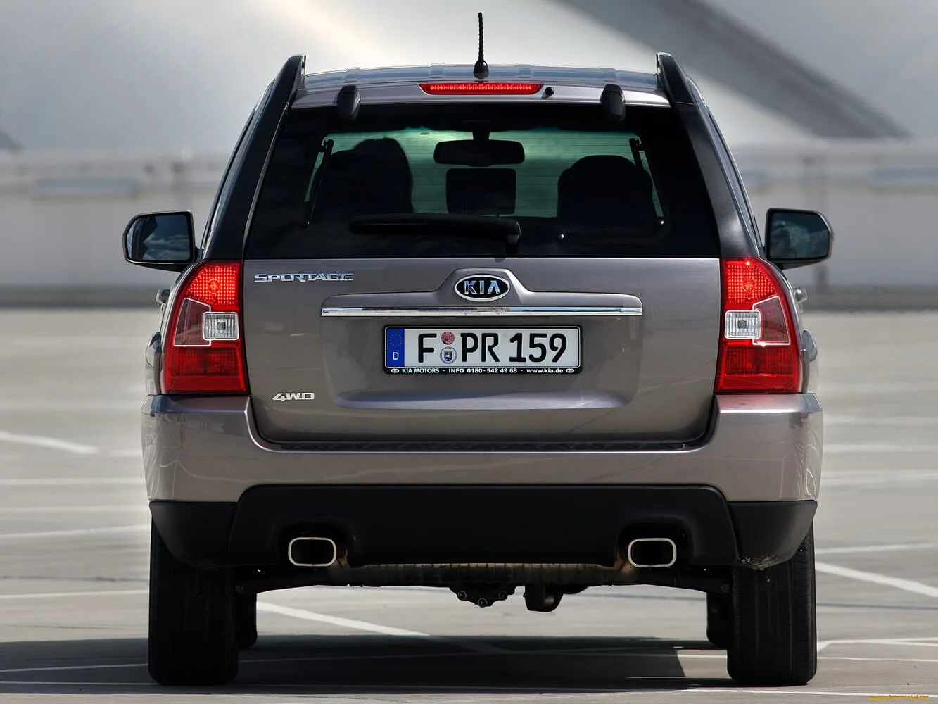 Kia Sportage II Рестайлинг — фото 4