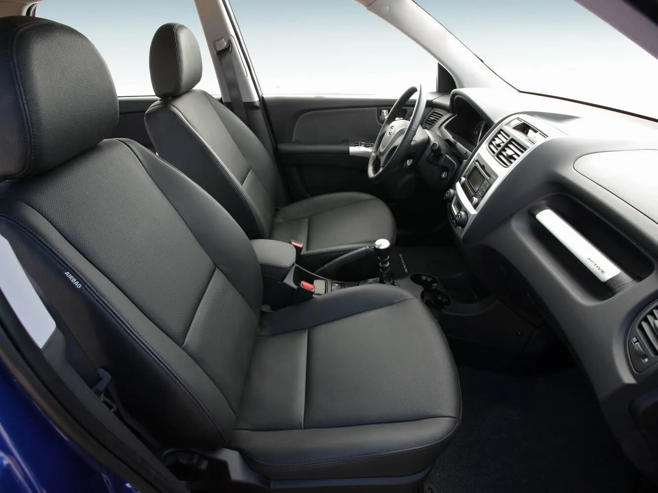 Kia Sportage II Рестайлинг — фото 5