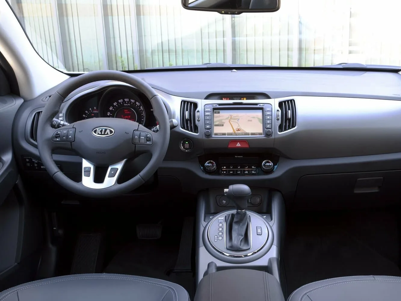 Kia Sportage III — фото 5