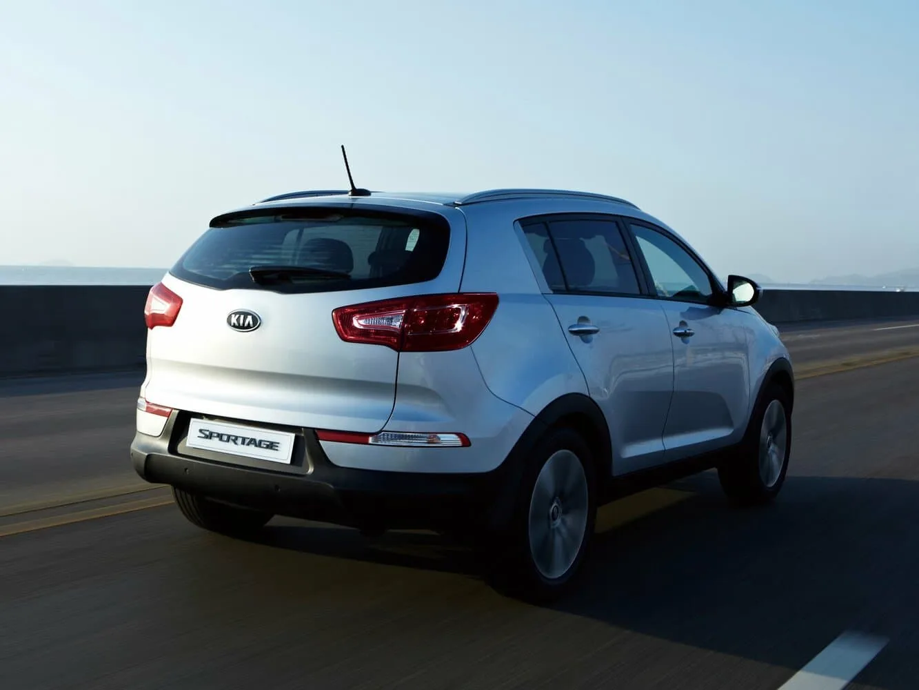 Kia Sportage III — фото 6