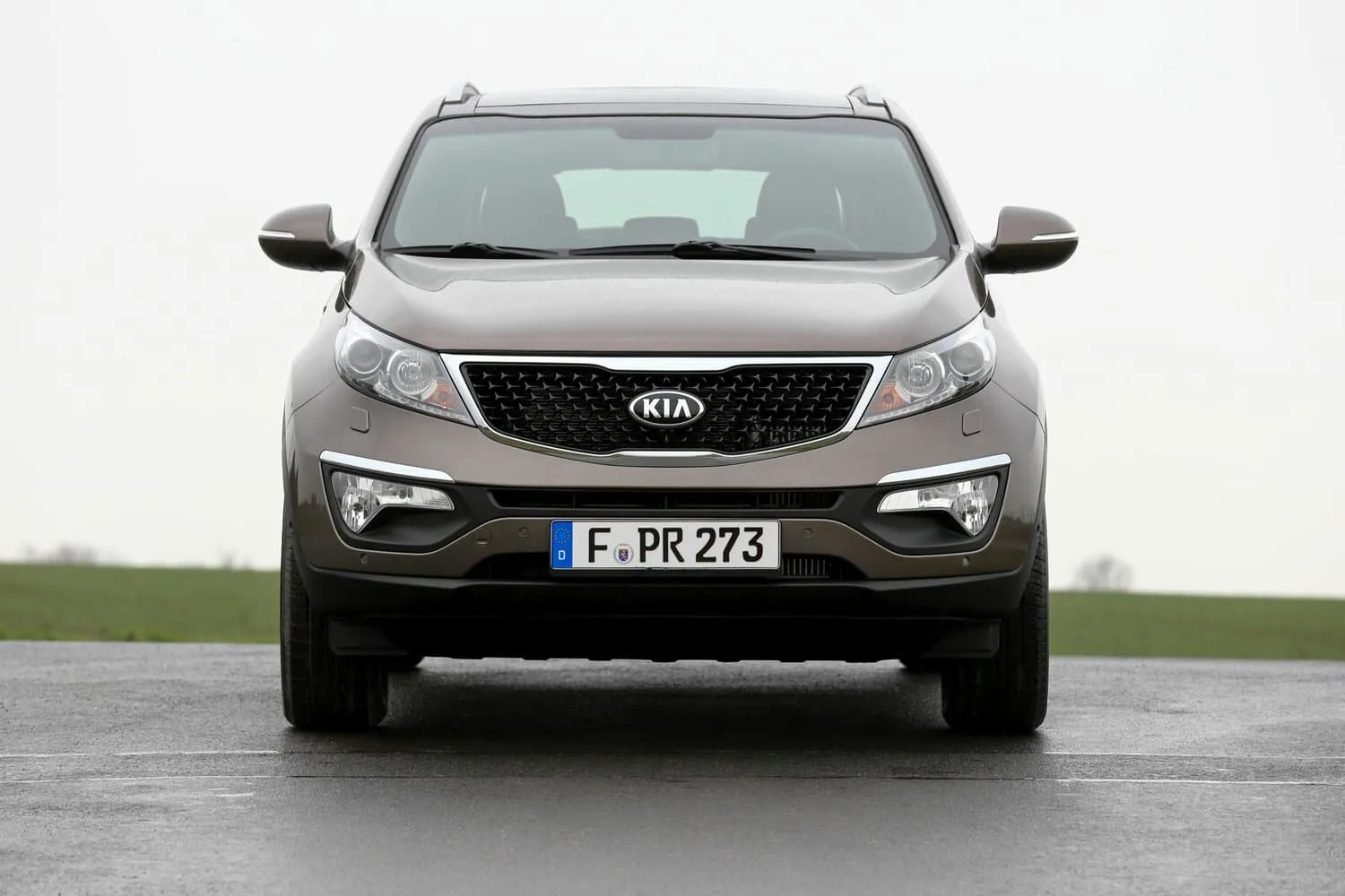Kia Sportage III Рестайлинг — фото 2