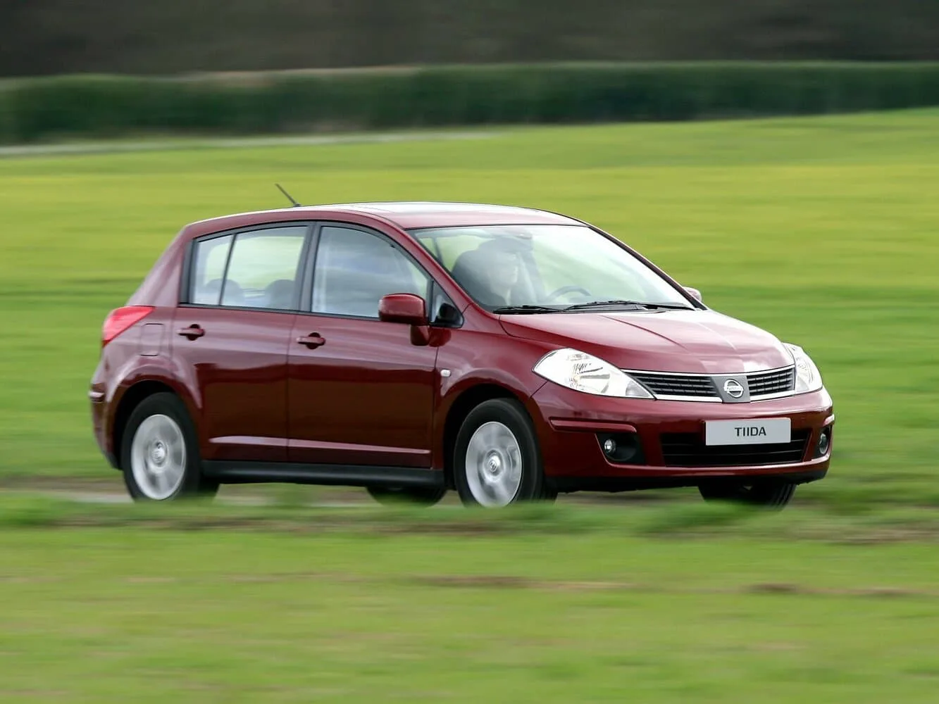 Nissan Tiida I Рестайлинг